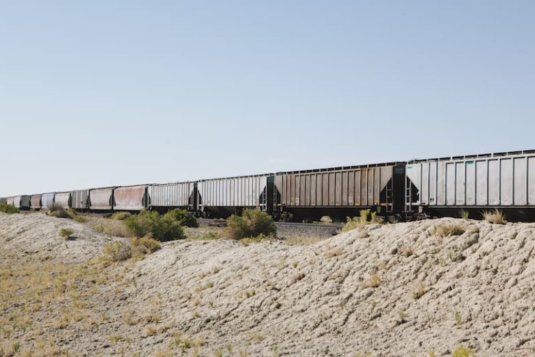 intermodal containers on a train going through the dessert
