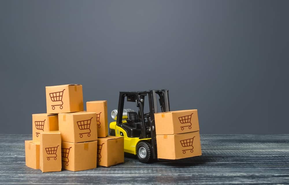 forklift moving boxes shipping terms concept image